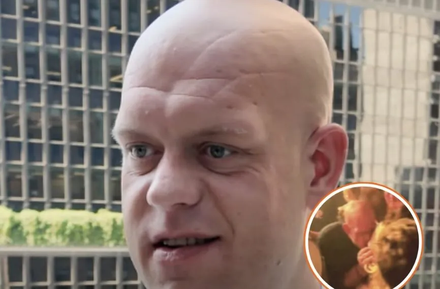 Michael van Gerwen gefilmd terwijl hij uitgebreid staat te tongen met knappe blondine