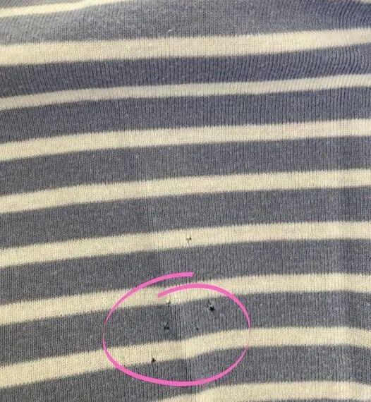 Hoe een gat in kleding te herstellen zonder naald en draad te gebruiken